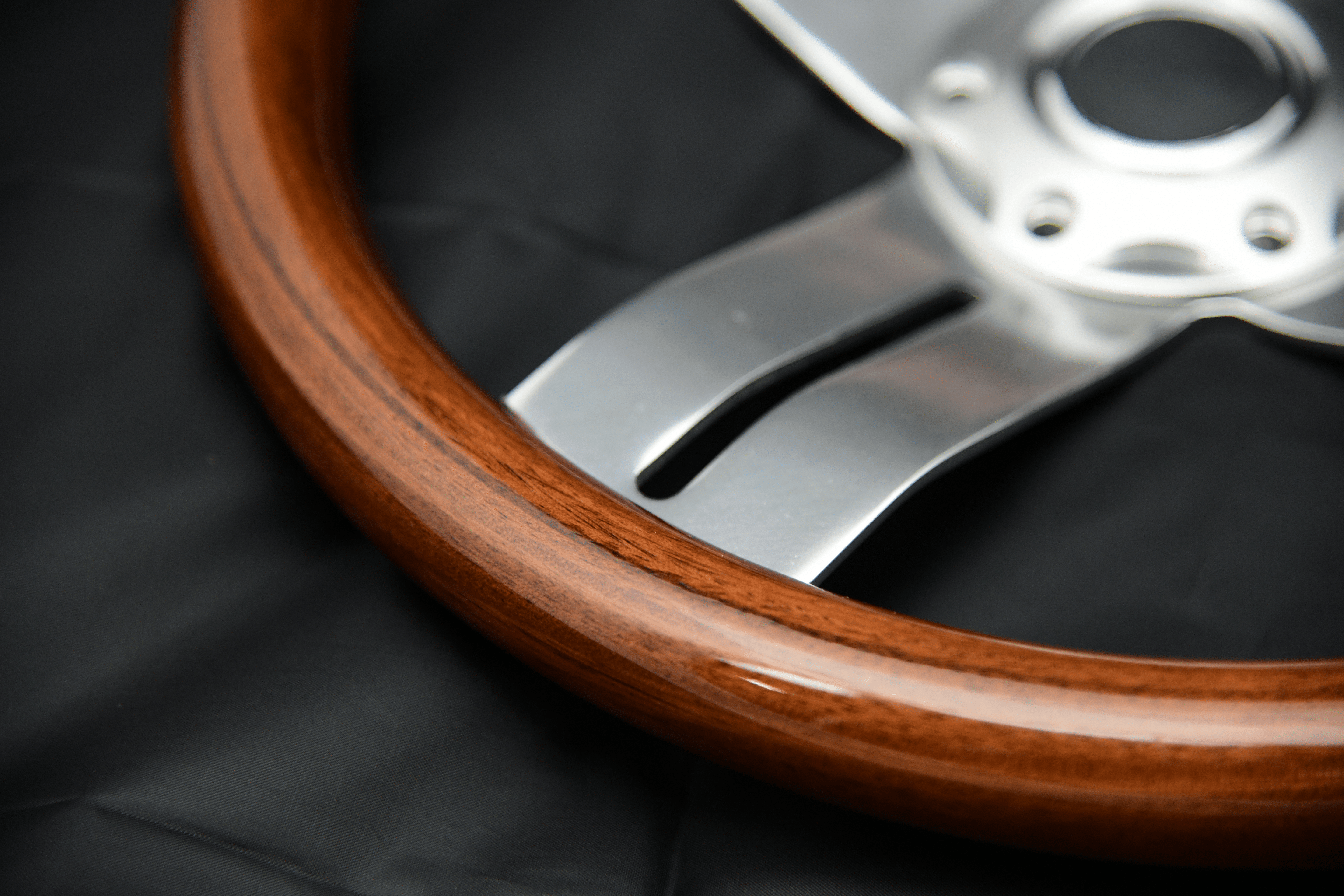 Classic Vintage 4-Spoke Okoume Wood Racing Boat Steering Wheel close up